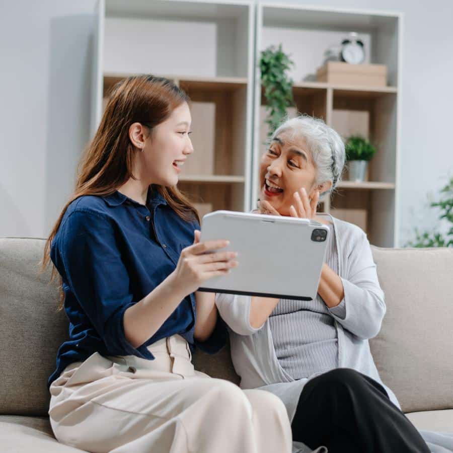 The Retreat at Alameda | Senior woman looking at a tablet